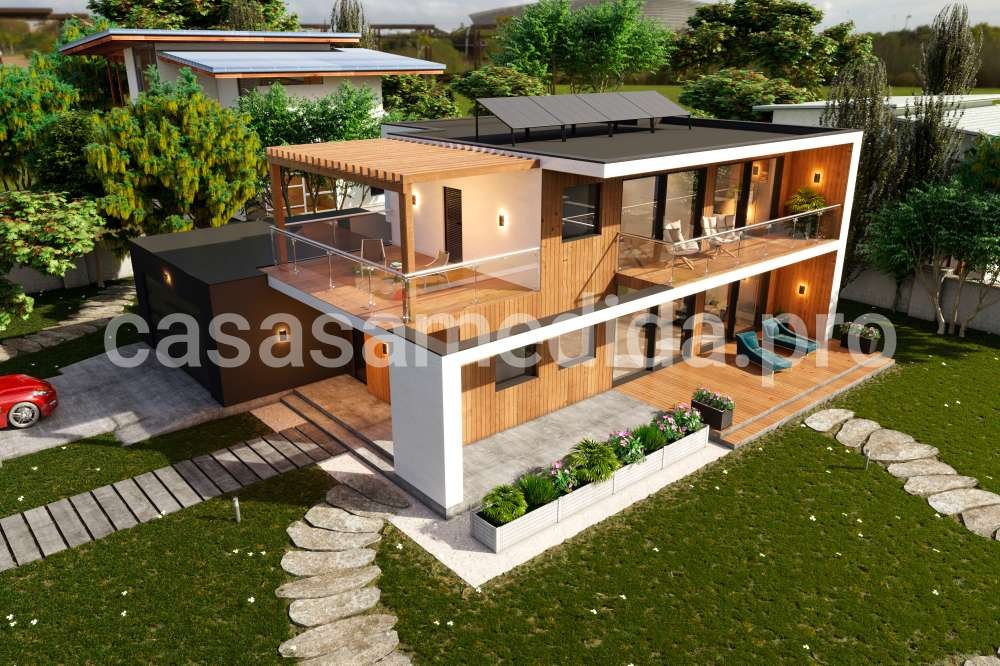 Casa prefabricada de dos plantas de líneas rectas y estilo contemporáneo, tejado plano, fachada exterior mixto de mortero revoco y madera ranurada de primera calidad. La planta baja tiene un amplio porche y planta primera tiene una amplia terraza cubierta y una amplia terraza semicubierta. Las ventanas grandes permiten tener la casa con luz solar todo el día. La casa dispone de un amplio gaje.
